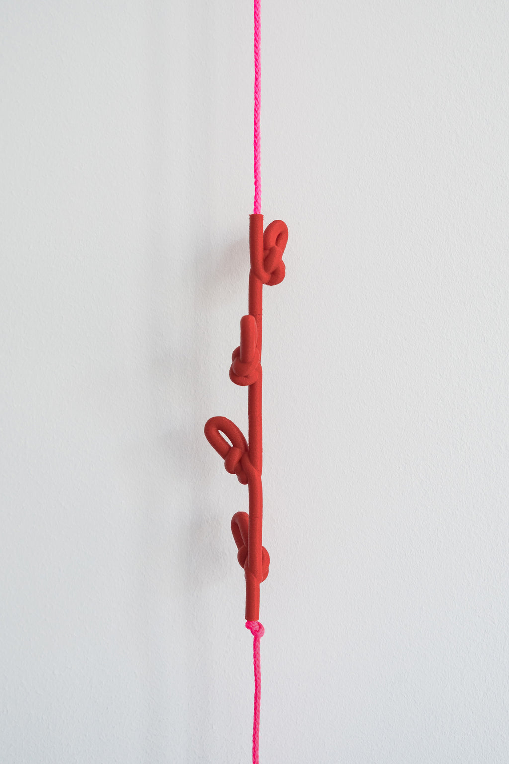 KNOTTED COAT RACK - RED NEON PINK
