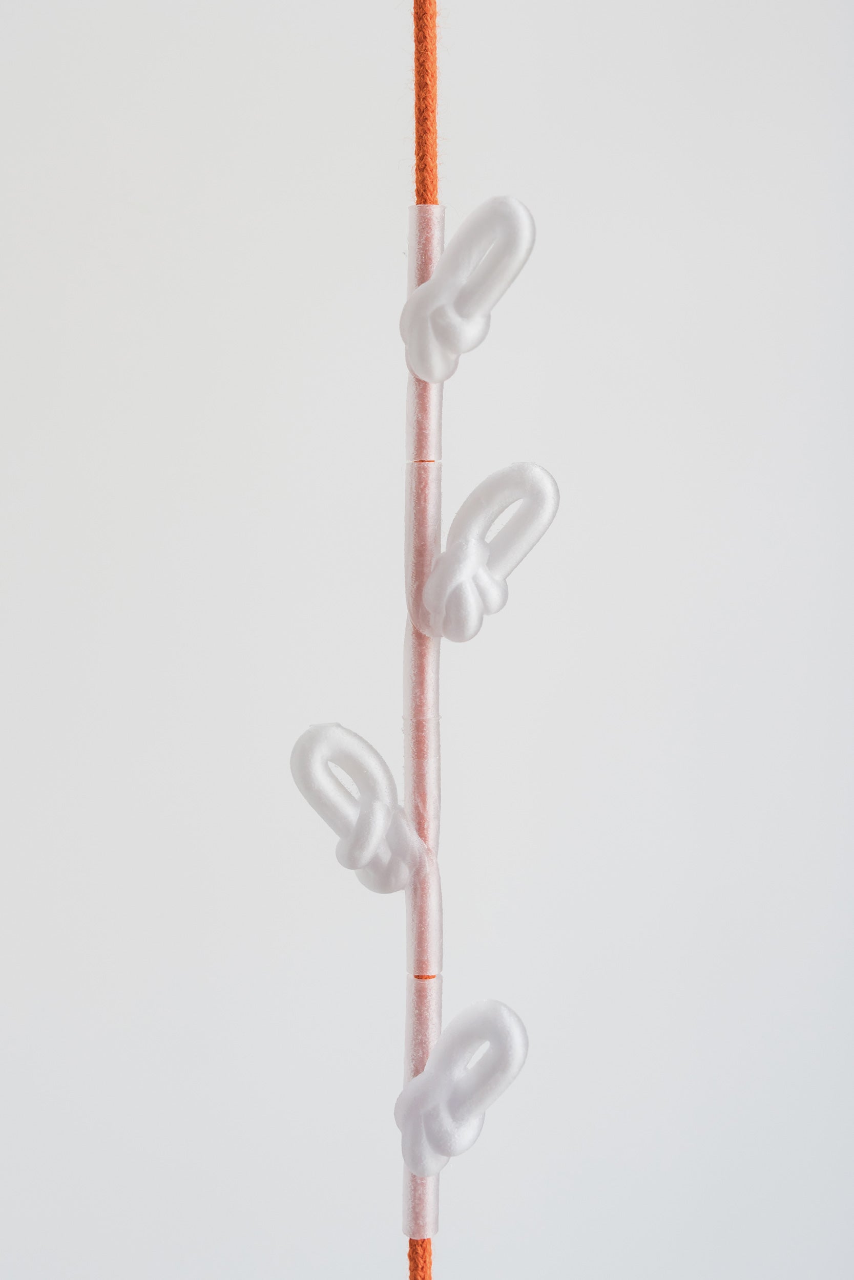 KNOTTED COAT RACK - TRANSPARENT ORANGE