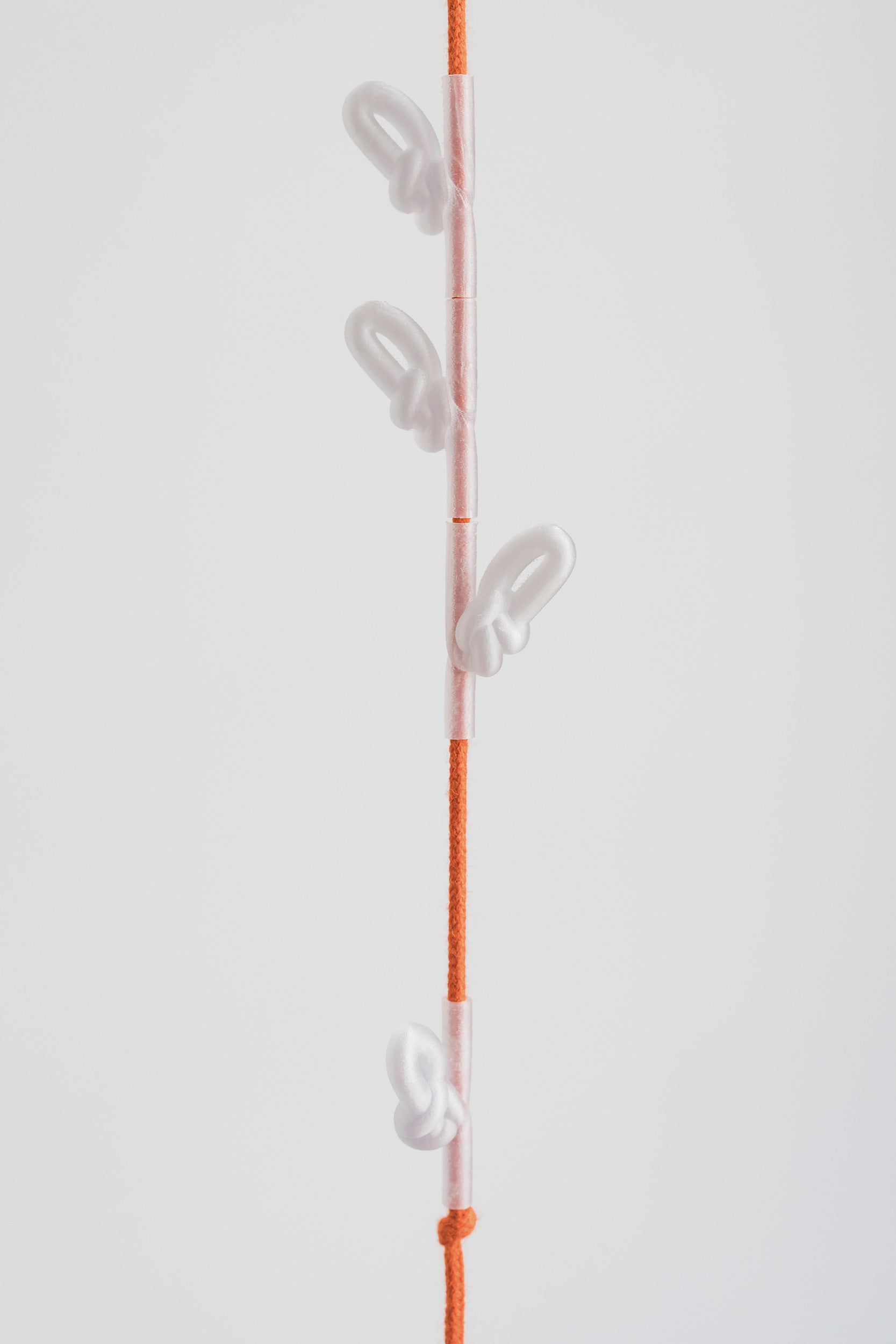 KNOTTED COAT RACK - TRANSPARENT ORANGE